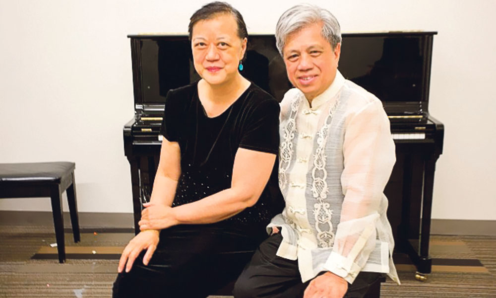 Dr. Yeou-Cheng Ma, executive director of the Children’s Orchestra Society, with her husband Michael Dadap