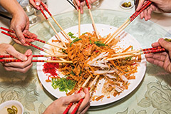 In Singapore and Malaysia, tossing and eating yusheng (Lo-Hei Yu Sheng 捞起鱼生) is a popular activity during Chinese New Year. Source:123RF