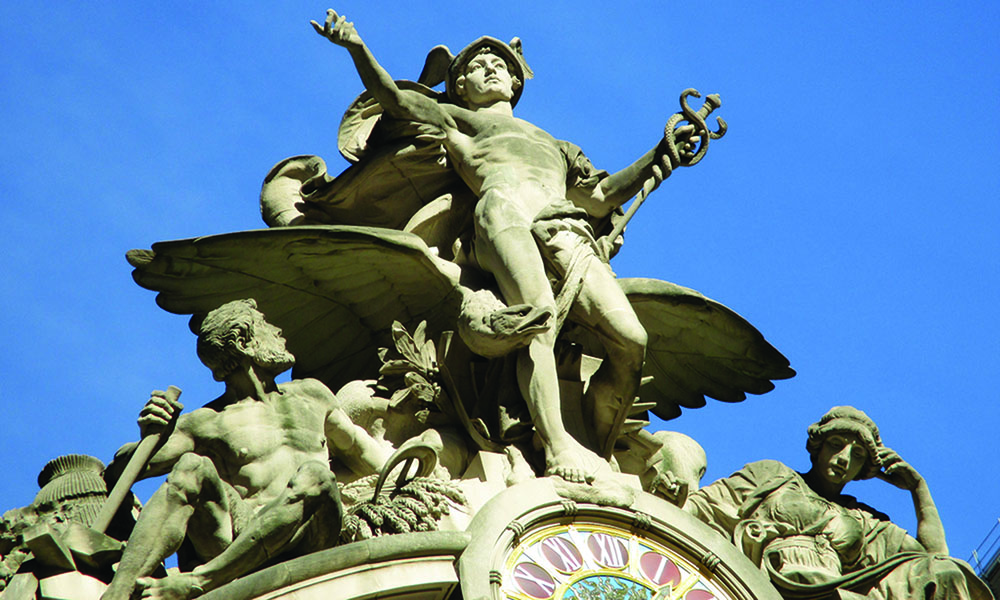 Hercules, Minerva and Mercury statues on top of the frontage of the Grand Central Terminal in New York.